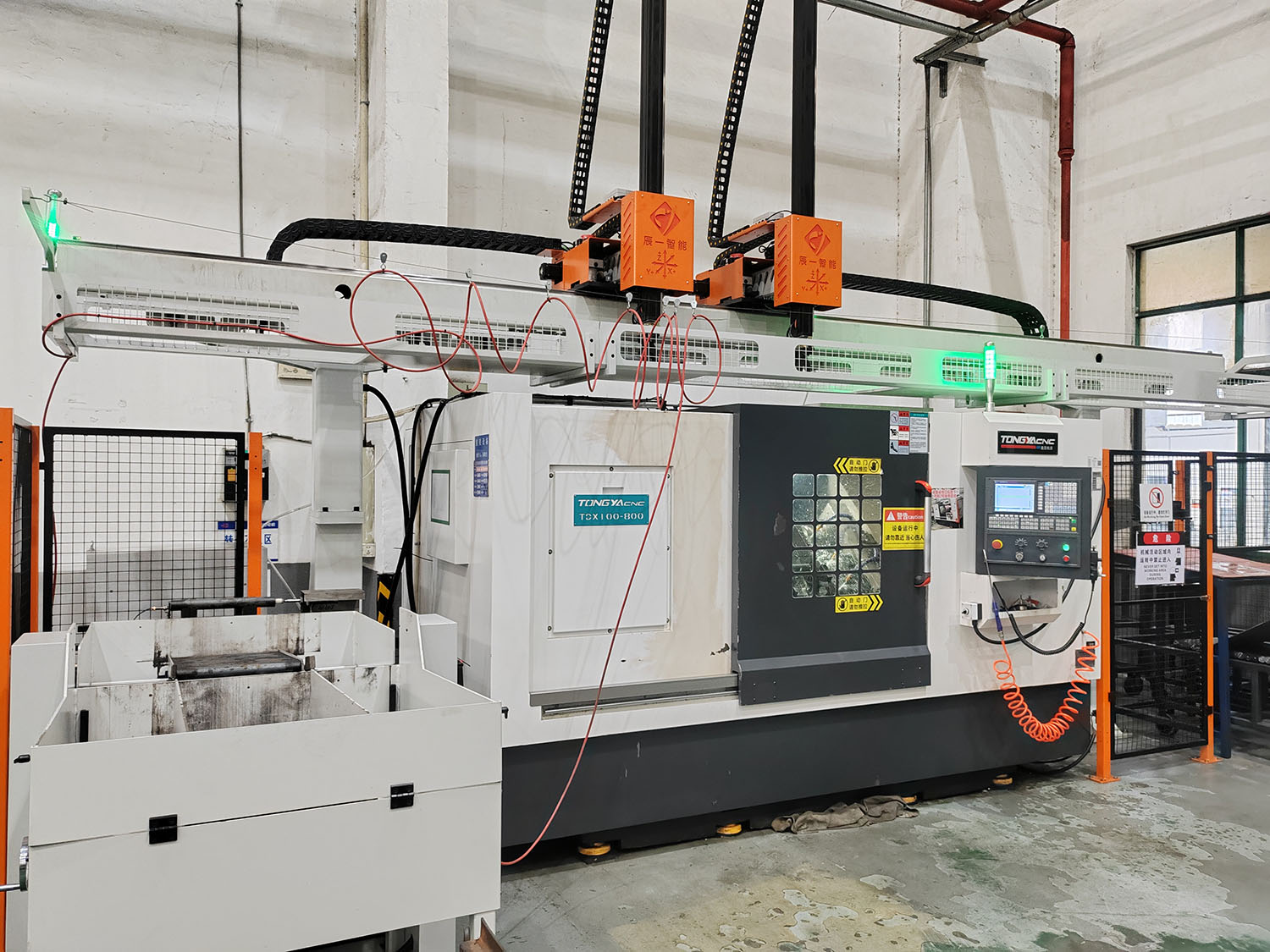 轴铣端面钻中心孔自动送料机械手